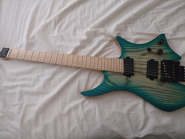Headless guitar on sale with tremolo