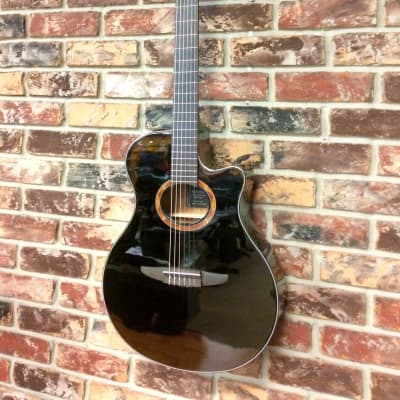 Yamaha NTX700 Black Acoustic Electric Cutaway  Classical Nylon String Guitar image 1