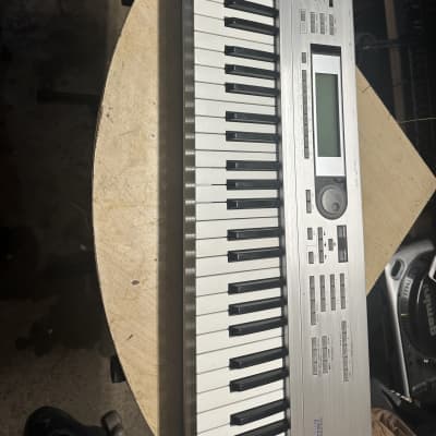 Korg Triton LE 61-Key 62-Voice Polyphonic Workstation 2000 - 2002 - Silver