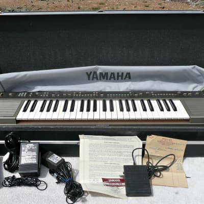 Vintage 1980s Yamaha PS-55 Portable Keyboard w/ ​Hardshell Case​, Dust Cover, Expression Pedal, Music Stand, Power Supply, Case Straps + Warranty Card - PV MUSIC Inspected and Tested - Works / Sounds Great - Near Mint Condition