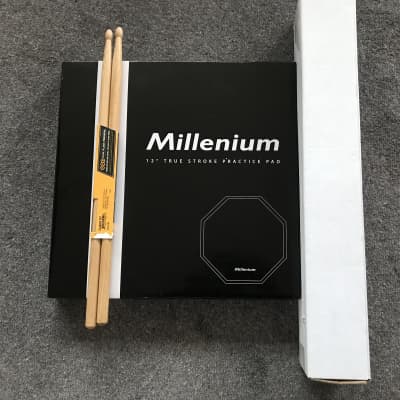 Practicing drum pad set *brand new* Millenium True Stroke Pad 12’, stand and sticks image 4