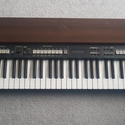 Roland VK-7 organ/piano, late '90s - natural wood finish.