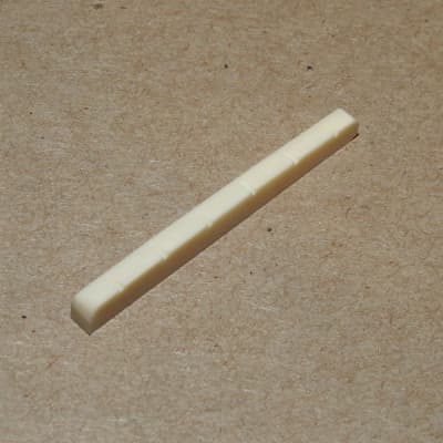 Allparts BN-0251-000 Bleached And Slotted Flat Bottom Nut for Fender Style Guitars 1 11/16" Long image 3