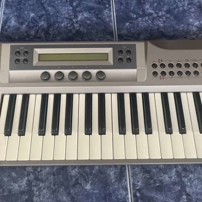 Korg Prophecy 1990s - Silver with Flightcase