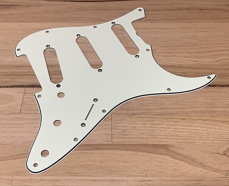 Authentic Fender parts 62 style Mint Green Pickguard and shielding plate 2010 Mint green image 1