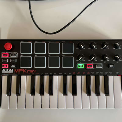 Akai Professional MPK Mini MKII | 25-Key Portable USB MIDI Keyboard With 8 Backlit Performance Pads, 8-Assignable Q-Link Knobs & A 4-Way Thumbstick