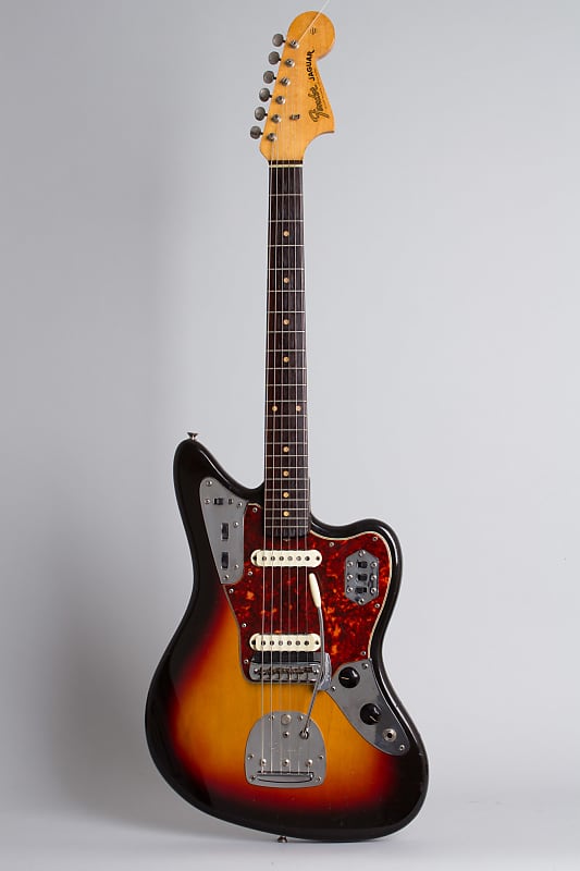 Fender  Jaguar Solid Body Electric Guitar (1962), ser. #91240, original brown tolex hard shell case. image 1