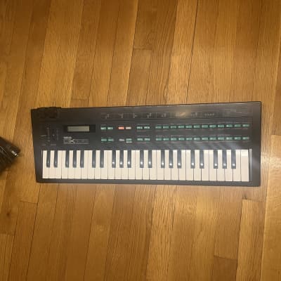 Buy used Yamaha DX100 Programmable Algorithm Synthesizer 1985 - Black