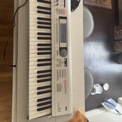 Korg Triton LE 61-Key 62-Voice Polyphonic Workstation 2000 - 2002 - Silver