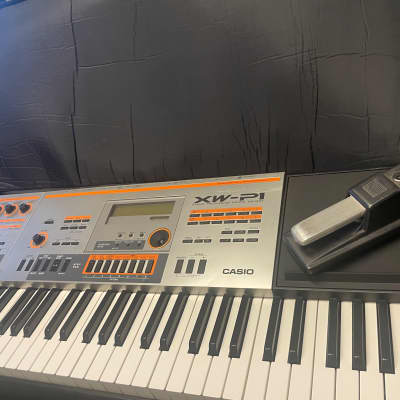 Casio XW-P1 61-Key Performance Synthesizer 2010s Roadrunner case, Roland Pedal