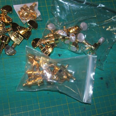 lot of (18)  gold tuners(2) 3x3  with screws & all hardware needed...(1) 6 in line w/pearloid button image 2