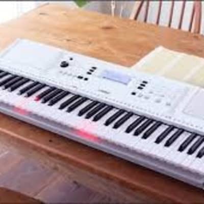 Yamaha EZ300 61-Key Lighted Key Portable Keyboard image 1