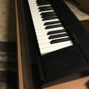 Yamaha Piaggero NP-12b Portable Piano, 61 key - Black