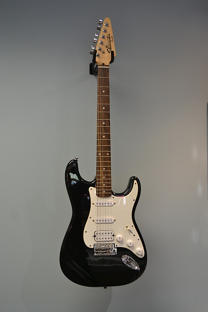 Fender starcaster electric guitar hot sale black and white