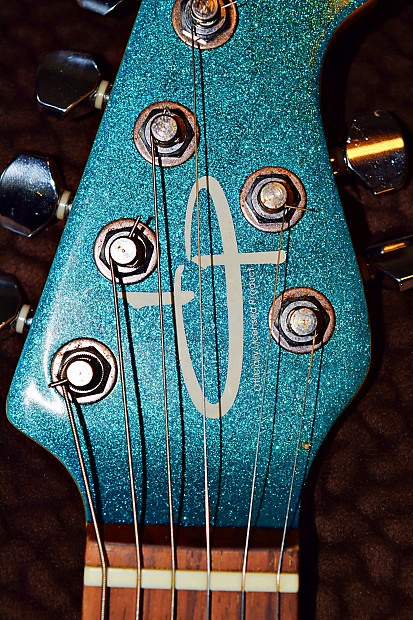 Ernie Ball OLP MM4 Silhouette-style Deep Blue Sparkle Finish