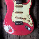 1964 Fender Stratocaster in Fiesta Red finish. With hard shell case