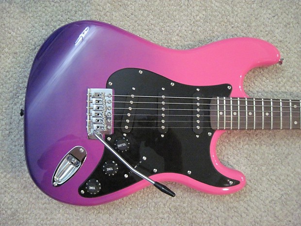 Pink and purple guitar on sale