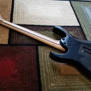 Ibanez Prestige RG1527 7 string MIJ Brass Block&Hardshell
