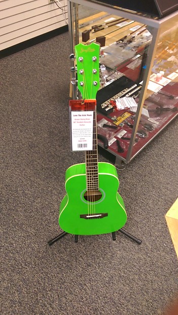 Half size outlet steel string guitar