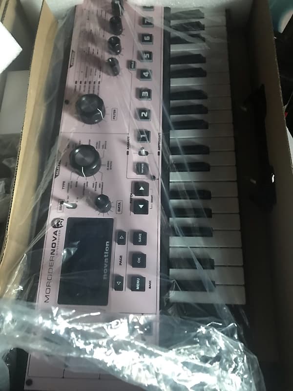 only one ever made *** ultra rare *** Pink Novation Morodernova Sia edition 1/1 April 2015 Pink and white text with gold green changing decals on wood paneling image 1