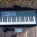 Korg Poly-800 Polyphonic Analog Synthesizer + factory  tape and case