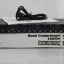 dbx 1046 Quad Compressor Limiter in box with manual power supply
