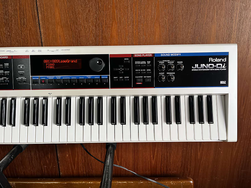 Roland Juno-Di Portable 61-key Mobile Synthesizer White color w/ gig bag