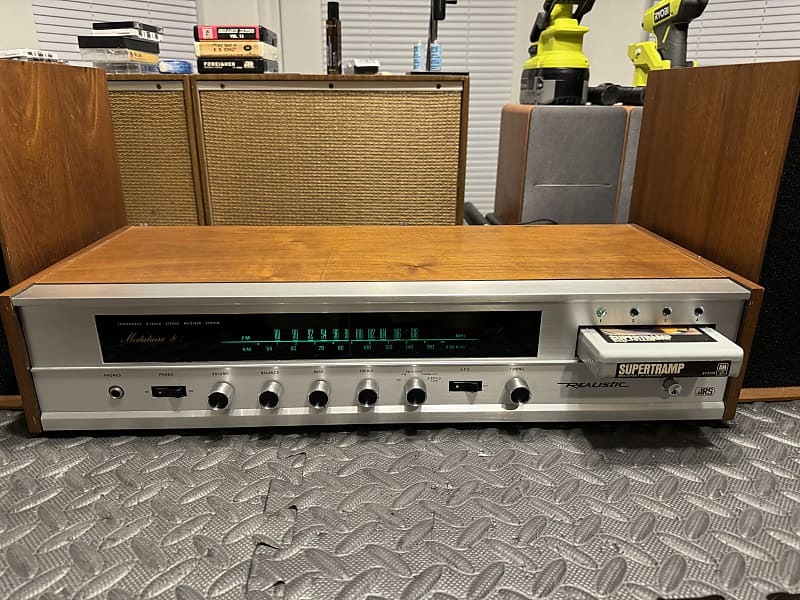 Outlet Realistic AM FM reciever and 8Track with orginal speakers.