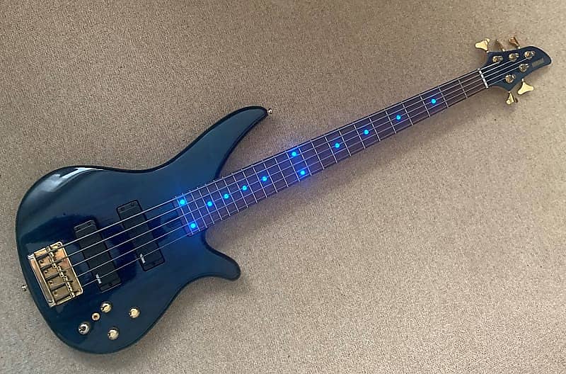 Yamaha RBX765A 5 string bass. Trans Blue with Simms LED'S