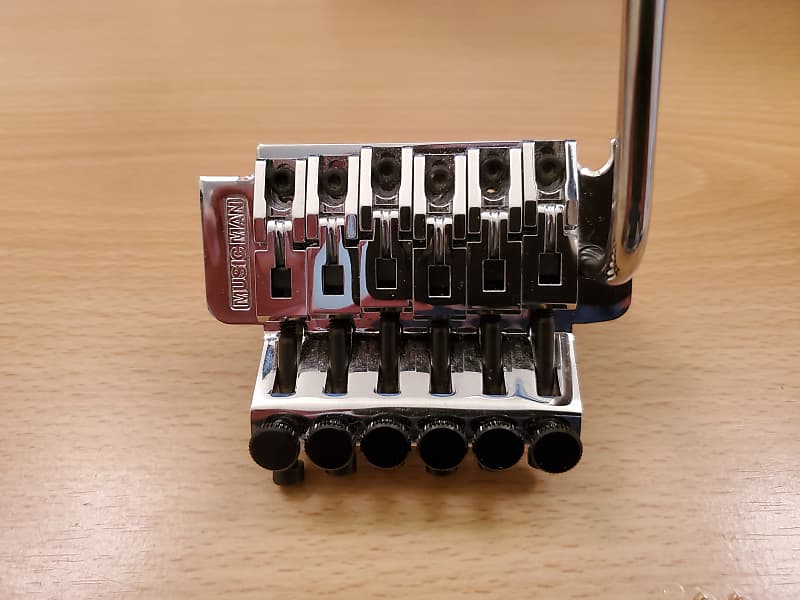 Music man tremolo deals bridge