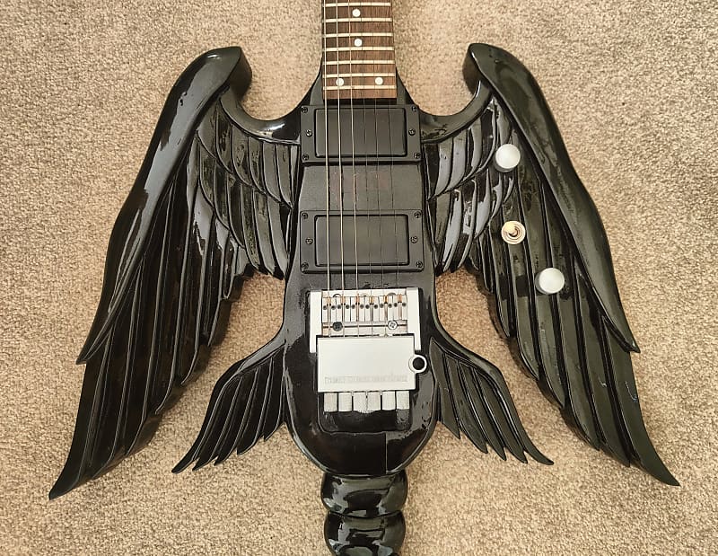 Winged headless guitar.