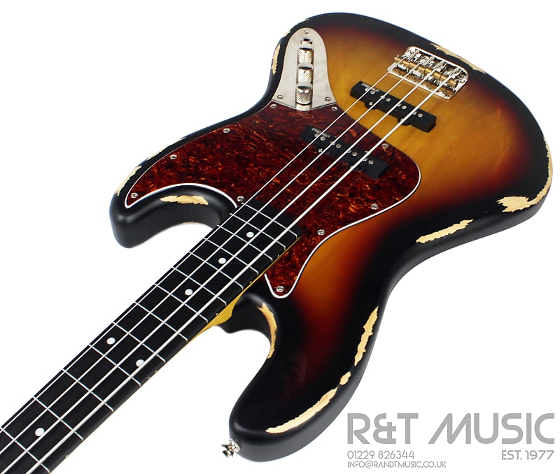 Vintage V74 Icon Fretless Bass Guitar in Distressed Sunset