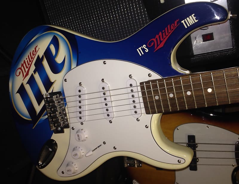 MILLER LITE Electric Guitar cool look / not so great player Reverb
