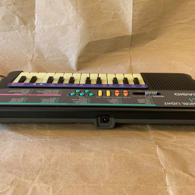 Casio ML-1 24-Key Magical Light Keyboard 1994 - Black in MINT Condition image 10