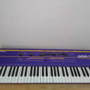 Roland Juno-106 Purple and Gold, overhauled by SynthSpa