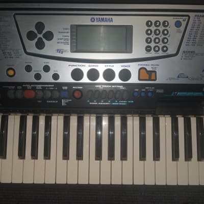 Yamaha PSR-340 Portatone Electronic Keyboard with Music