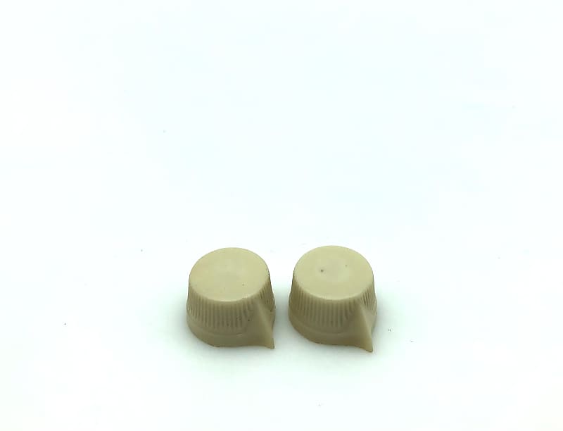 2 Vintage Daka-Ware Small Cupcake Pointer Knobs 19?? Ivory