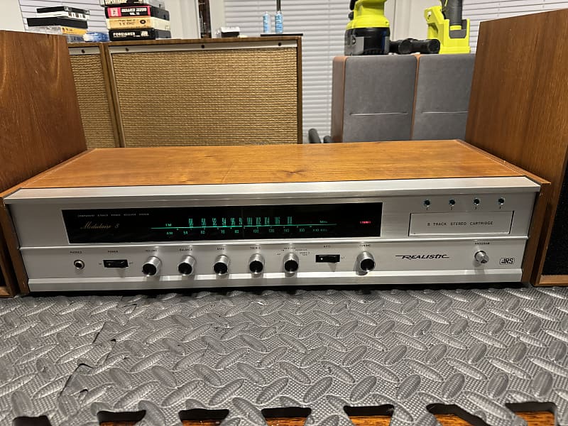 Outlet Realistic AM FM reciever and 8Track with orginal speakers.