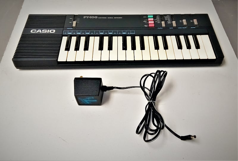 Casio Vintage Casio PT-100 32-Key Electronic Musical Instrument Keyboard  With Adapter