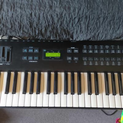 REDUCED PRICE: Alesis QS7 64 Voice, 76 Key Synth with 2 Expansion Cards