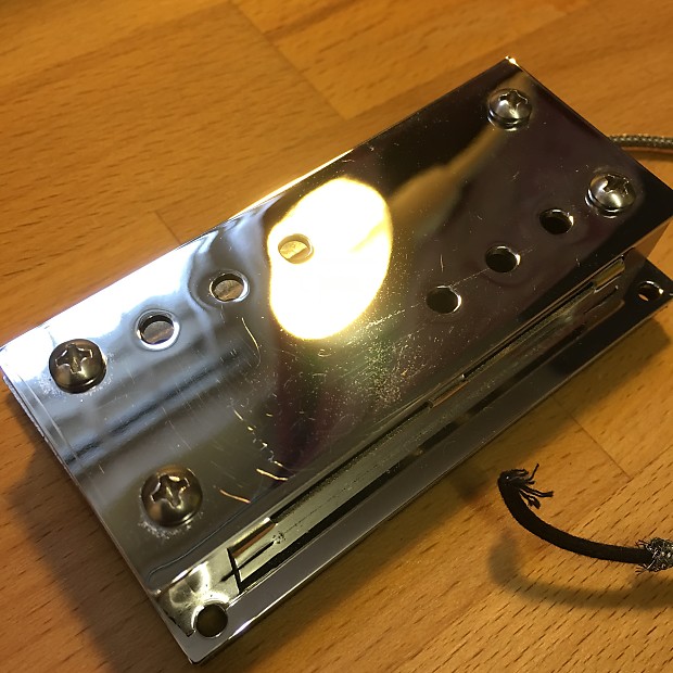 Lollar string through steel pickup top
