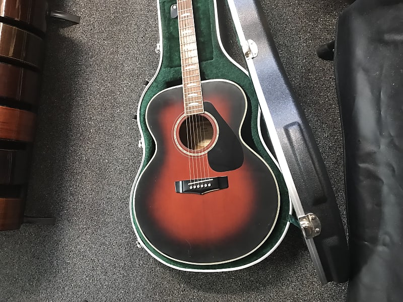 Yamaha FJ-645A rare jumbo body acoustic guitar made in Taiwan in violin red  finish with road runner hard case in excellent condition.