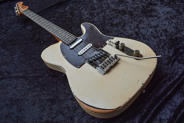 Telecaster with cheap strat tremolo