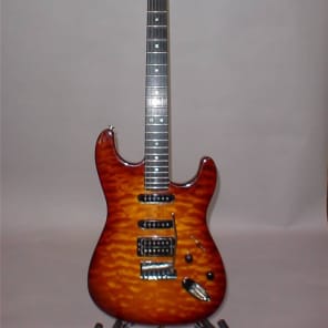 Previously Owned Fender American Deluxe Stratocaster 50th Anniv.  Amberburst Finish image 1