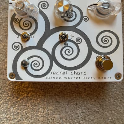 Reverb.com listing, price, conditions, and images for spiral-electric-fx-white-spiral-boost