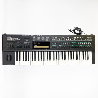 Vintage Yamaha DX7IID Synthesizer - Nostalgic Soundscapes from this Retro Classic