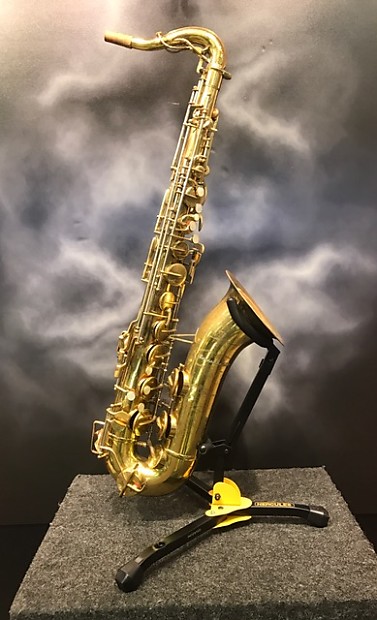 Buescher top hat and cane tenor store