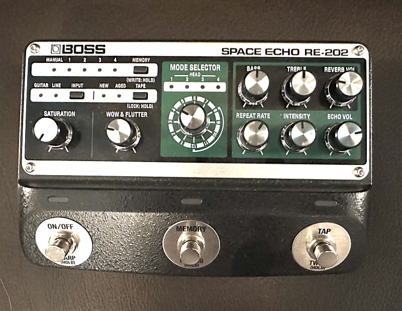 Boss RE202 Space Echo with power cord, documentation, and Reverb