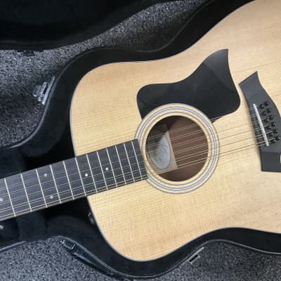 Taylor 150e walnut 12 String acoustic electric guitar made in Mexico 2017-2018 with ES2 electronics in excellent condition with original taylor deluxe hard case and case candy . image 14