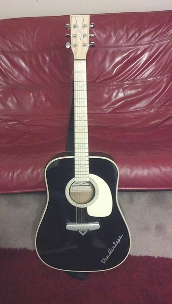 Tribute electric acoustic shop guitar